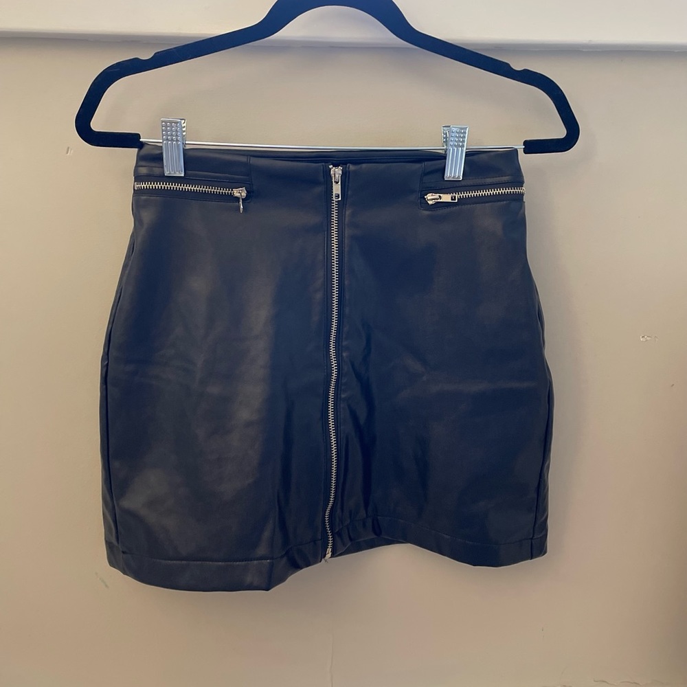 Black leather mini skirt with zipper details